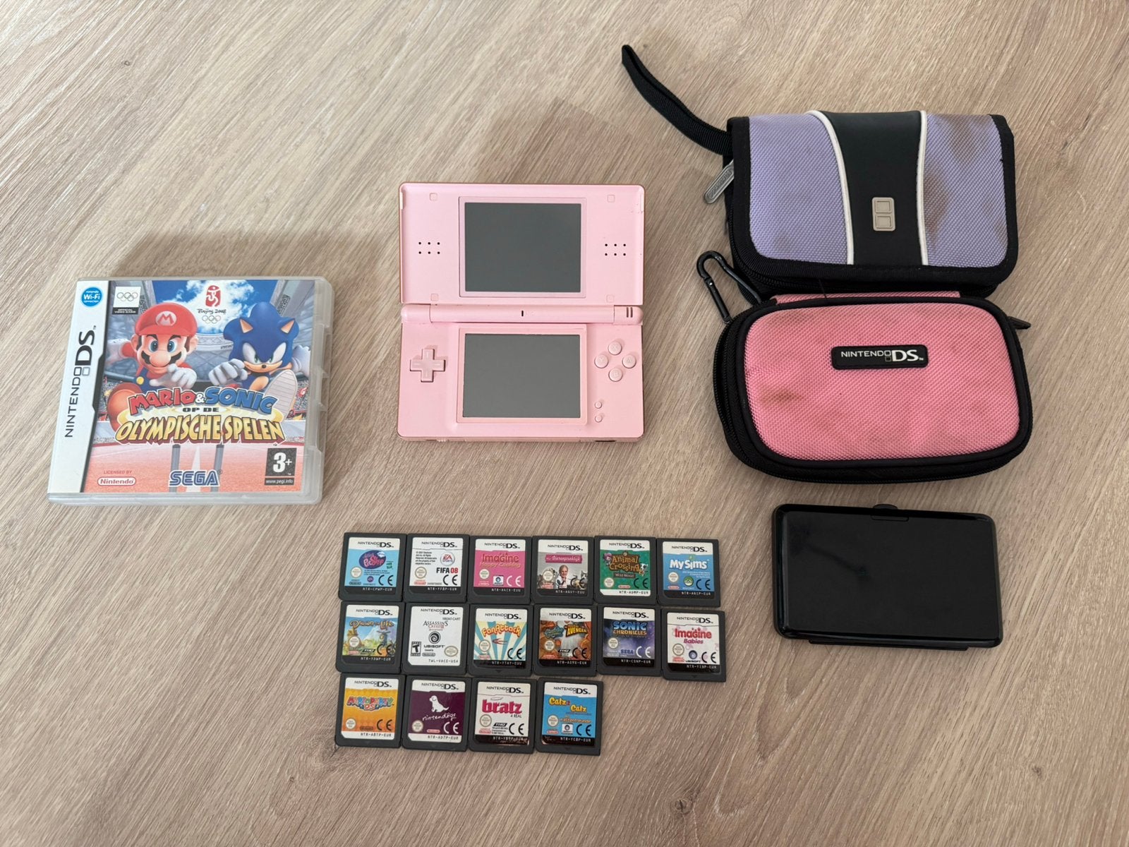 DS lite + 17 games!, Spelcomputers en Games, Ophalen of Verzenden, Zo goed als nieuw, Zwart, DS Lite