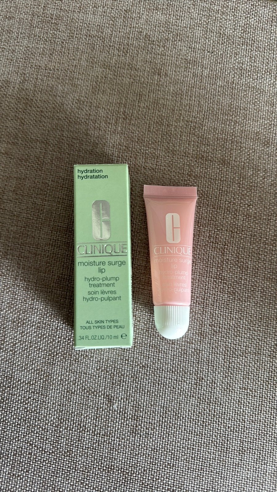 Clinique moisture surge lip lipbalm lipgloss10ml nieuw!, Verzenden, Nieuw, Lippen, Verzorging