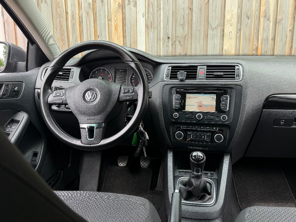 Volkswagen Jetta 1.2 TSI Navi Cruise Control Bluetooth Airco, Voorwielaandrijving, Euro 5, 4 cilinders, Parkeersensor