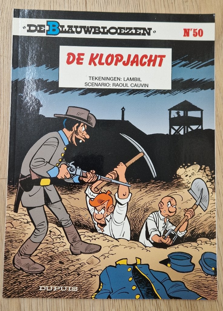 Blauwbloezen 50 De Klopjacht Lambil & Cauvin, Eén stripboek, Ophalen of Verzenden, Zo goed als nieuw