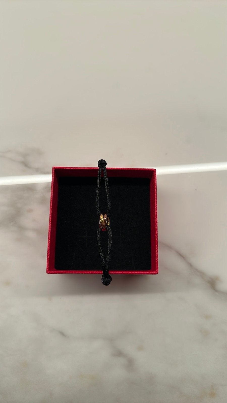 Cartier  Armband Zwart Koord, Ophalen of Verzenden, Zo goed als nieuw, Zwart, Goud