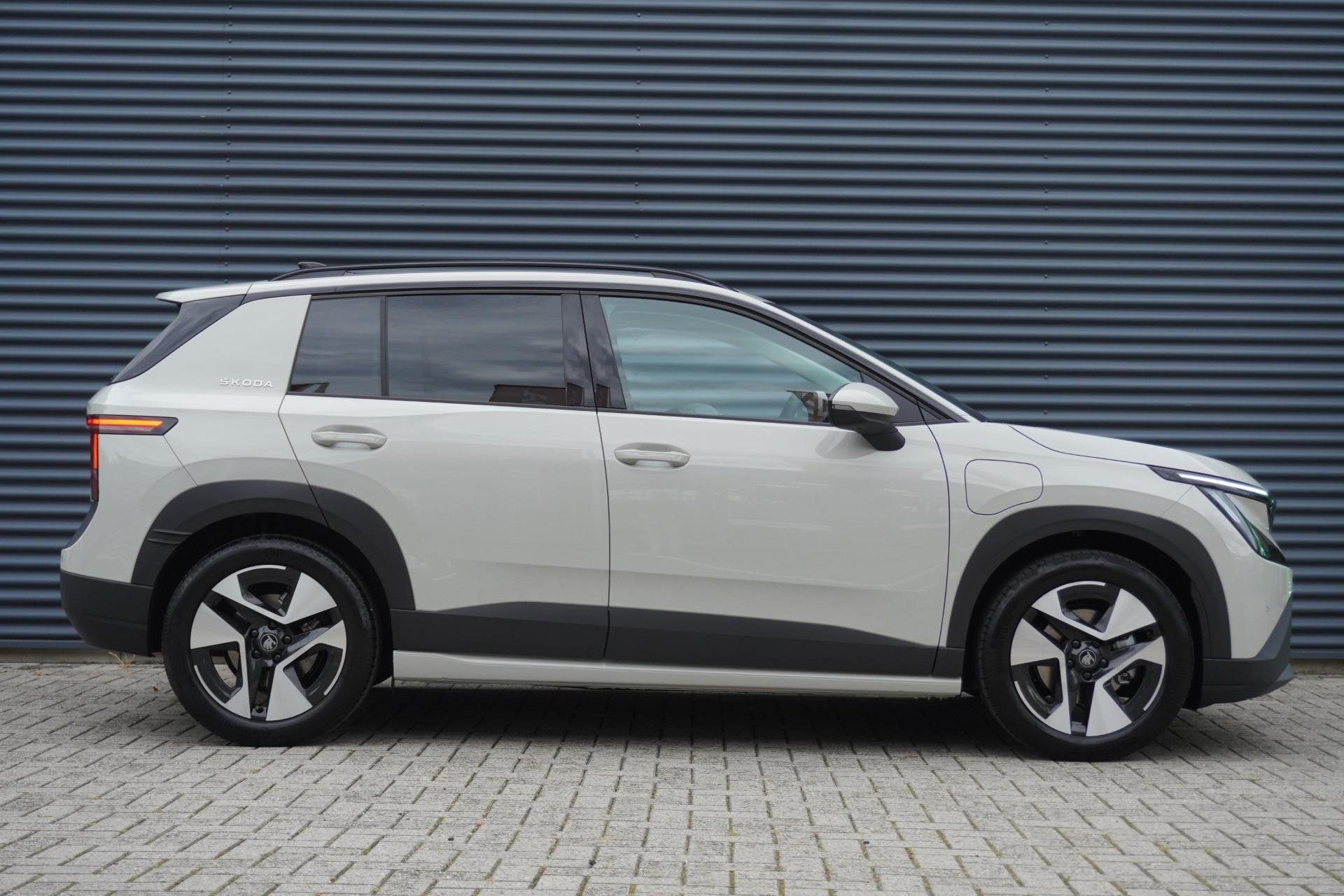 Skoda Epiq Hero 211pk 56 kWh | Matrix LED Koplampen | Achter, Auto's, Skoda, 12 maanden, Overige modellen, 56 kWh, 211 pk