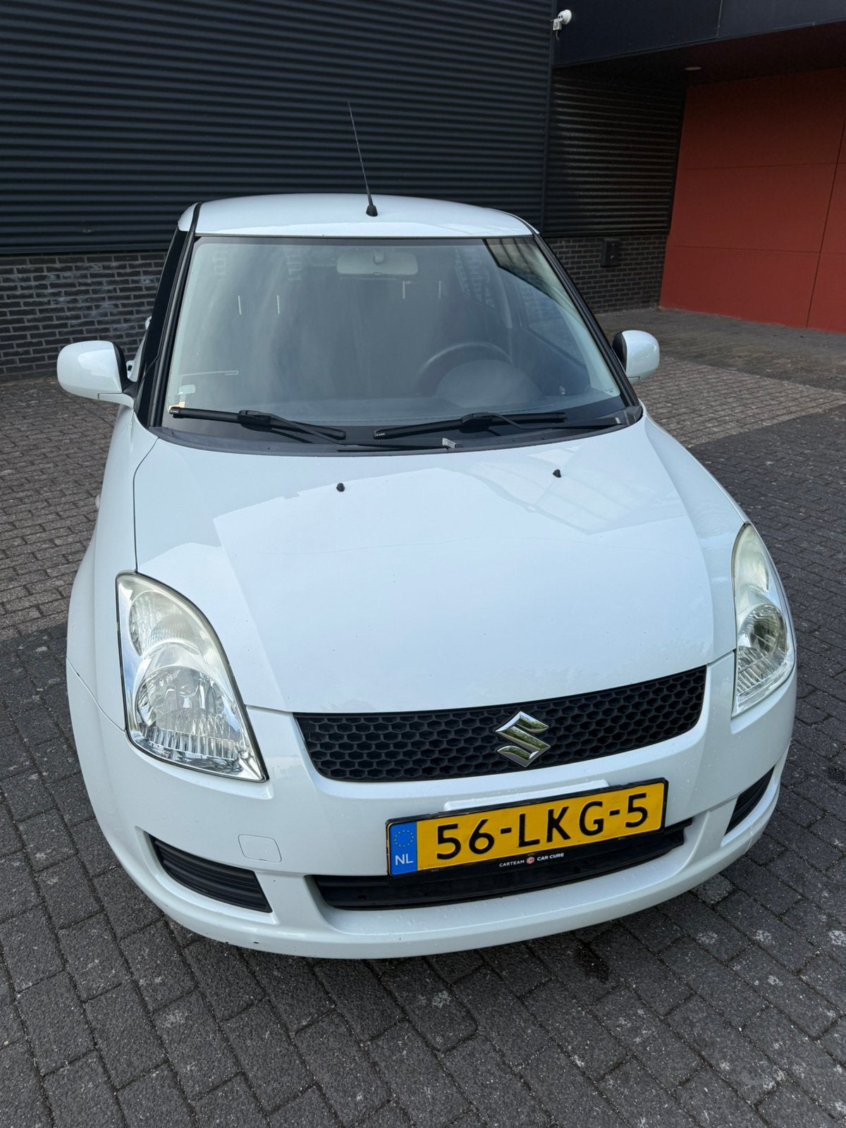 Suzuki Swift 1.3 5D 2010 Wit, Auto's, Voorwielaandrijving, Stof, 40 €/maand, 400 kg