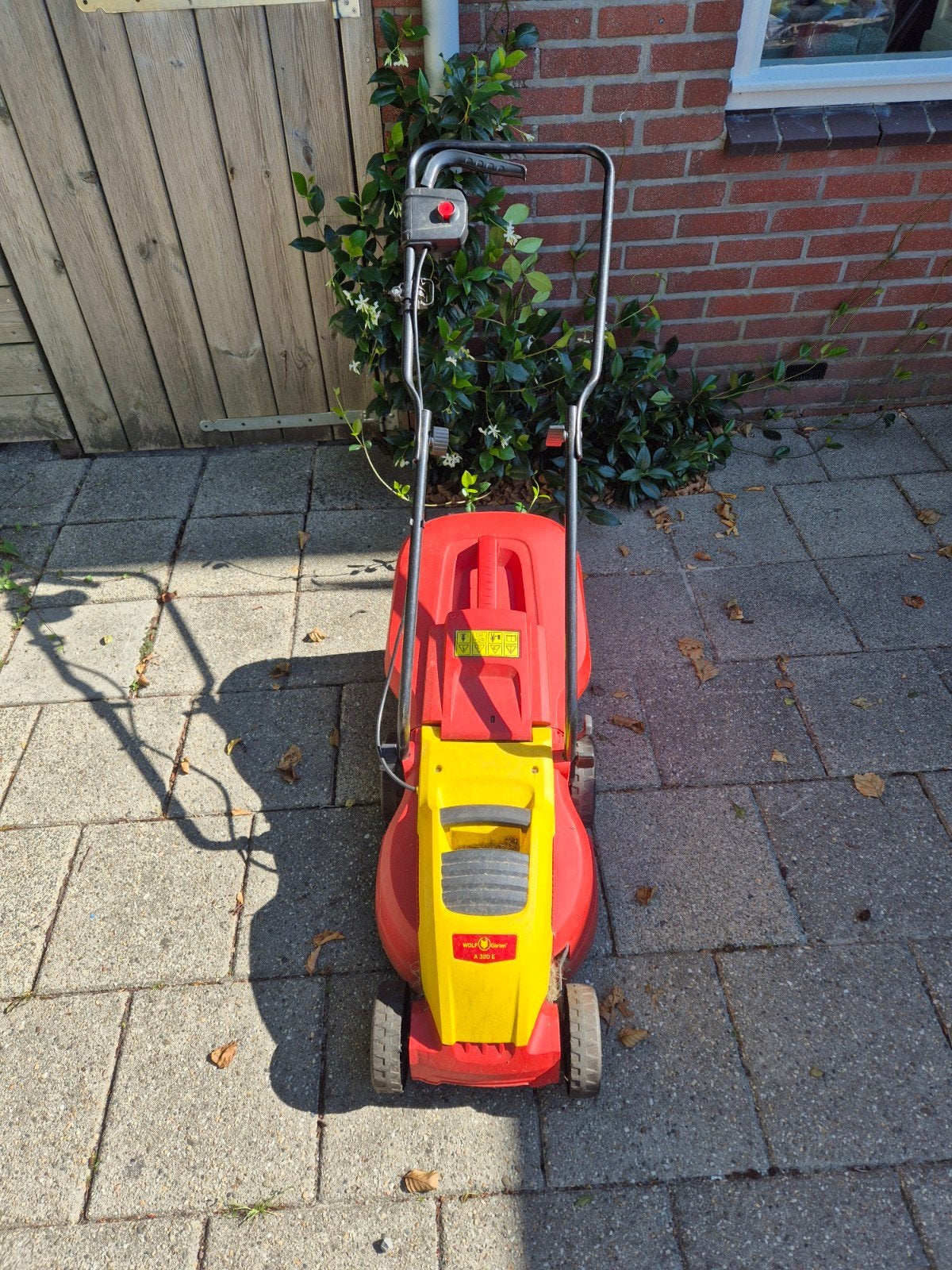 Goed werkende grasmaaier, Ophalen, Elektrische grasmaaier, Opvangbak, Wolf Garten