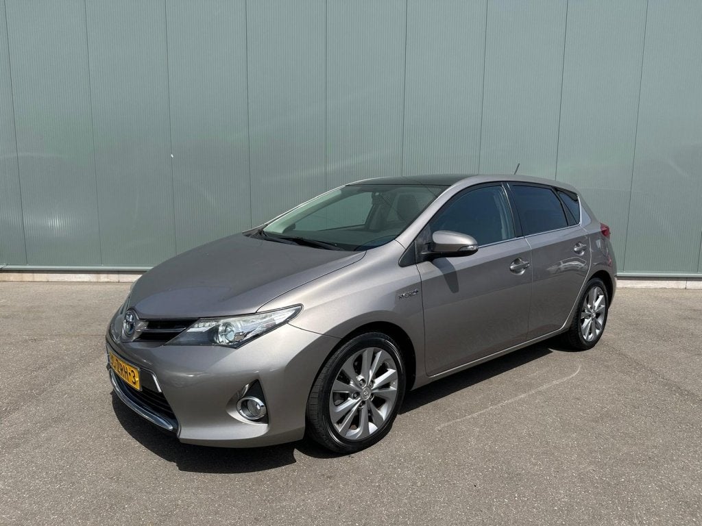 Toyota Auris 1.8 Hybrid Lease PANORAMADAK | CAMERA | NAP !, Auto's, Euro 5, 4 cilinders, Bruin, Origineel Nederlands