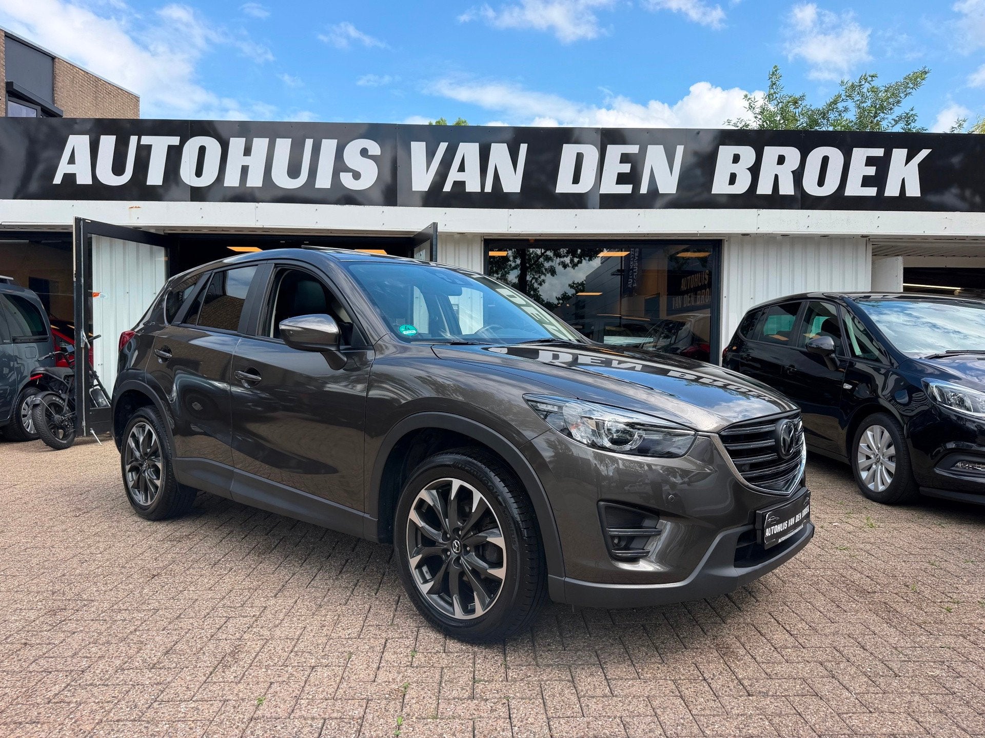 Mazda CX-5 2.5 SkyActiv-G 192Pk|GT-M|4WD|Dealer OH|Pano|Xeno, Auto's, Mazda, Automaat, Gebruikt, Zwart, Bruin