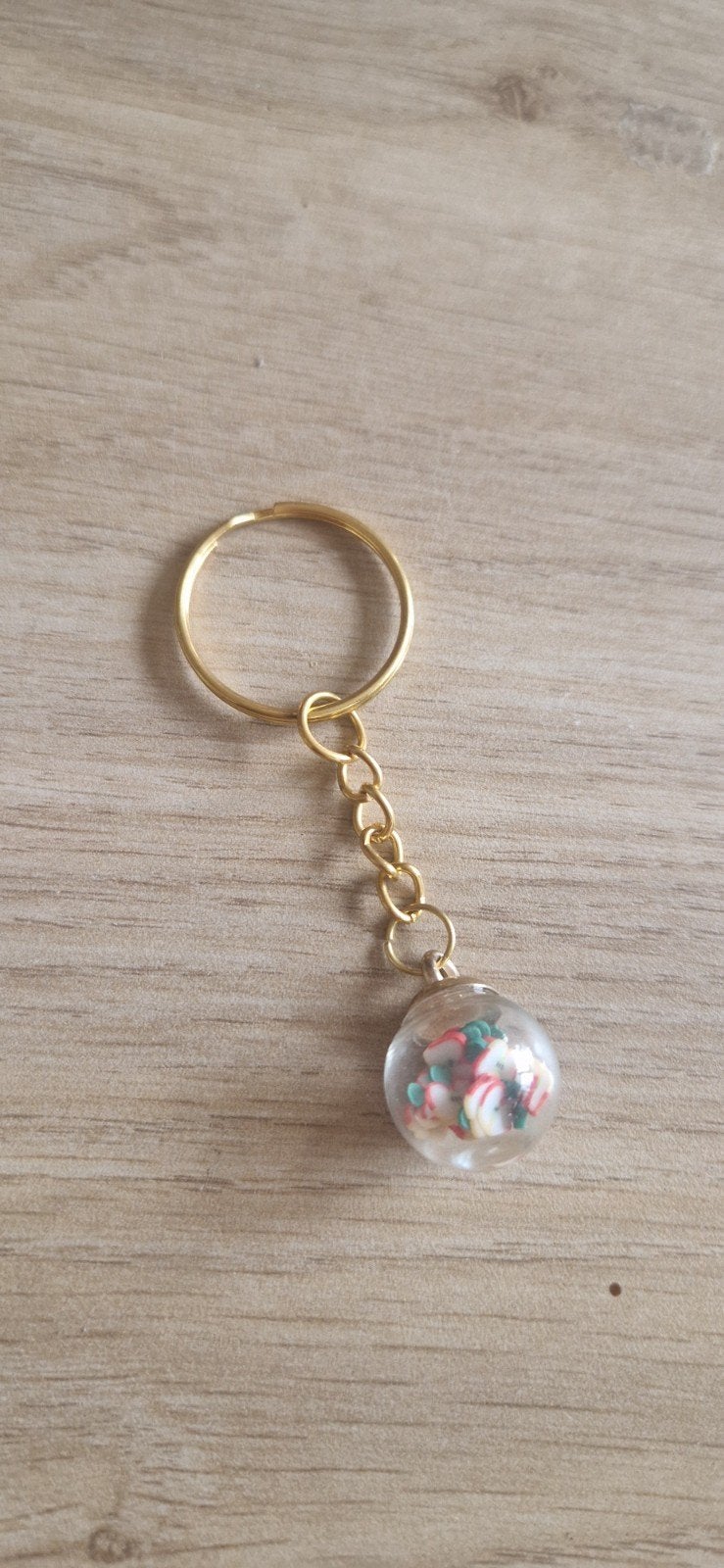 Leuke sleutelhanger met glazen bolletje en vulling, Ophalen of Verzenden, Nieuw, Overige typen