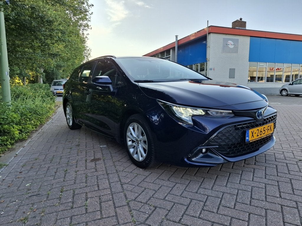 Toyota Corolla Touring Sports Hybrid 140 Active (bj 2024), Auto's, 12 maanden, 450 kg, Gebruikt, 4 cilinders