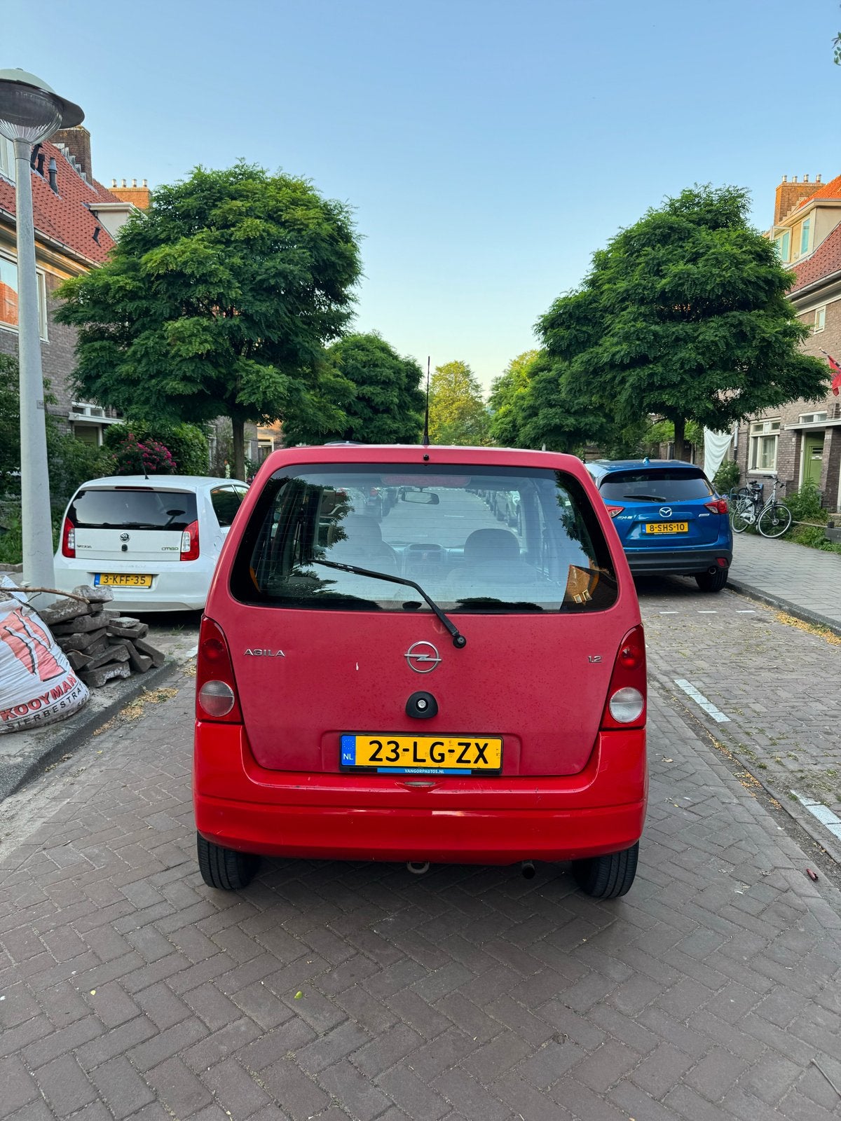 Opel Agila 1.2 I 16V 2002 Rood, Auto's, Opel, Voorwielaandrijving, 15 km/l, 74 pk, 31 €/maand
