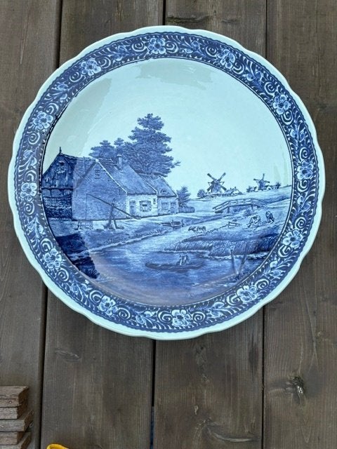 Delfts blauw wandbord, Ophalen