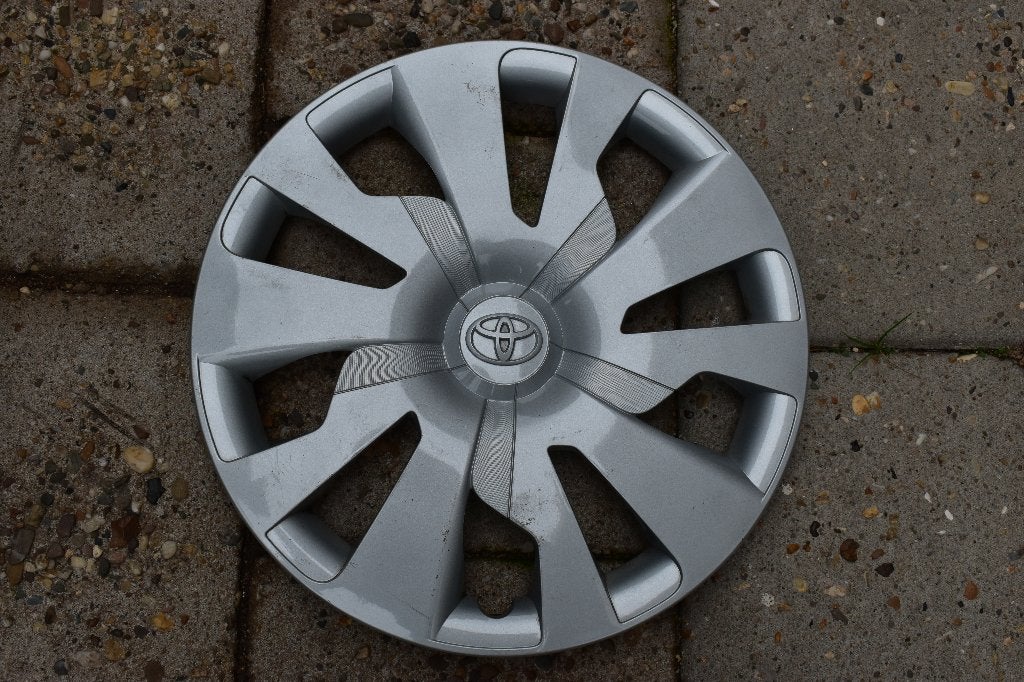 1 losse originele wieldop Toyota Yaris 15 inch (Model 1), Auto diversen, Wieldoppen, Ophalen of Verzenden, Gebruikt
