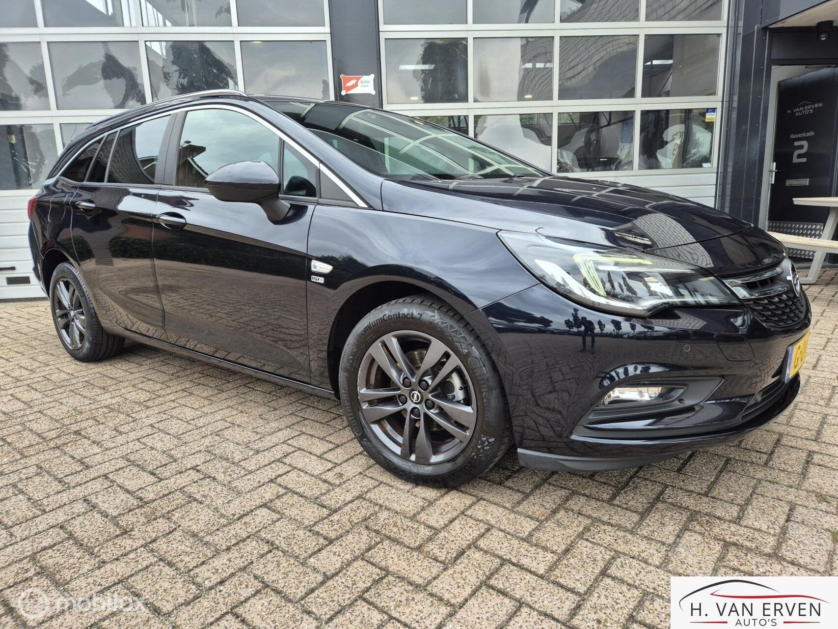 Opel Astra Sports Tourer 1.4 Turbo 120 Jaar Edition, Auto's, Voorwielaandrijving, 4 cilinders, 150 pk, Blauw