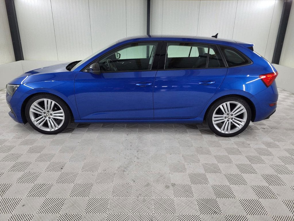 Skoda Scala 1.0 TSI Business Sport Edition Automaat, Carplay, Auto's, Skoda, Gebruikt, Euro 6, Blauw, 49 €/maand