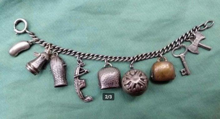 Vintage zilveren bedelarmband Srandstoel Molen etcetera, Gebruikt, Ophalen of Verzenden, Met bedels of kralen, Zilver