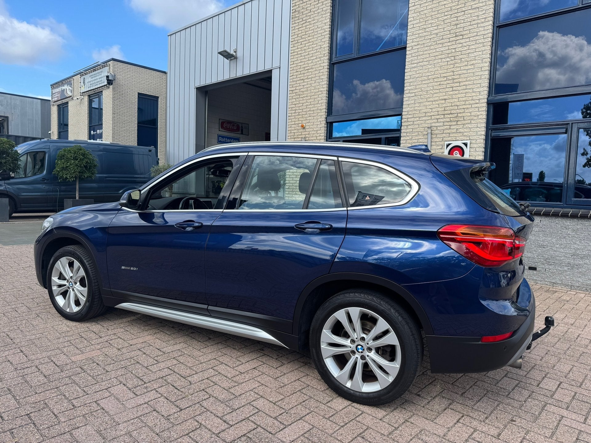 BMW X1 SDrive20i Centennial Executive- automaat- nl auto, Auto's, 1998 cc, Blauw, Leder en Stof, Origineel Nederlands