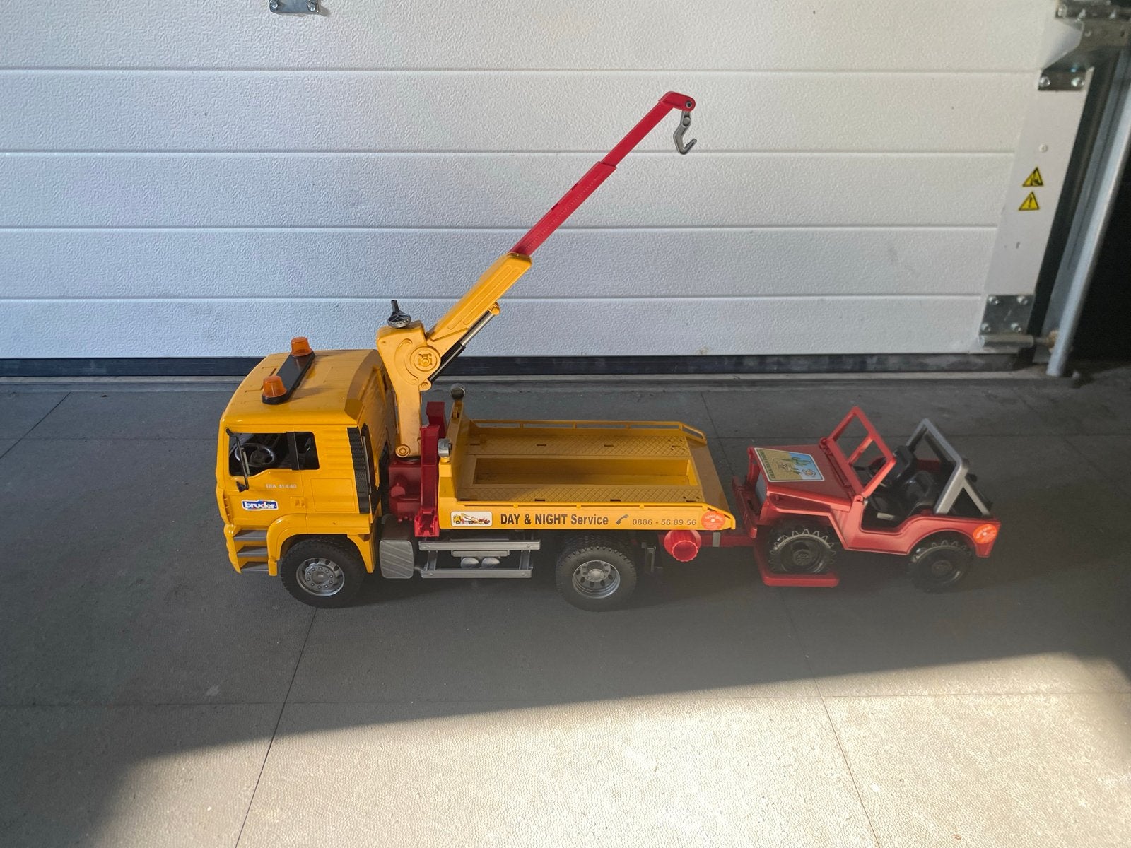 Bruder MAN TGA Takelwagen met Jeep Wrangler Rubicon, Ophalen of Verzenden, Gebruikt