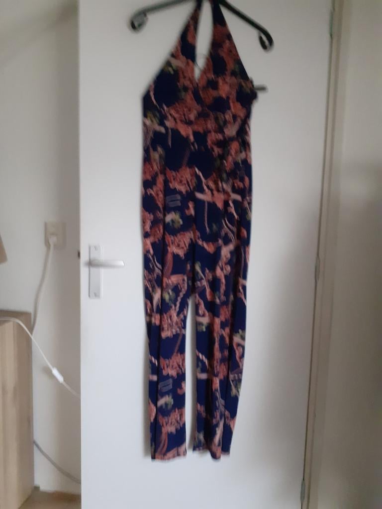 Jumpsuit met blote rug, maat 40/42      7.50euro, Ophalen of Verzenden, Gedragen, Maat 42/44 (L), Blauw