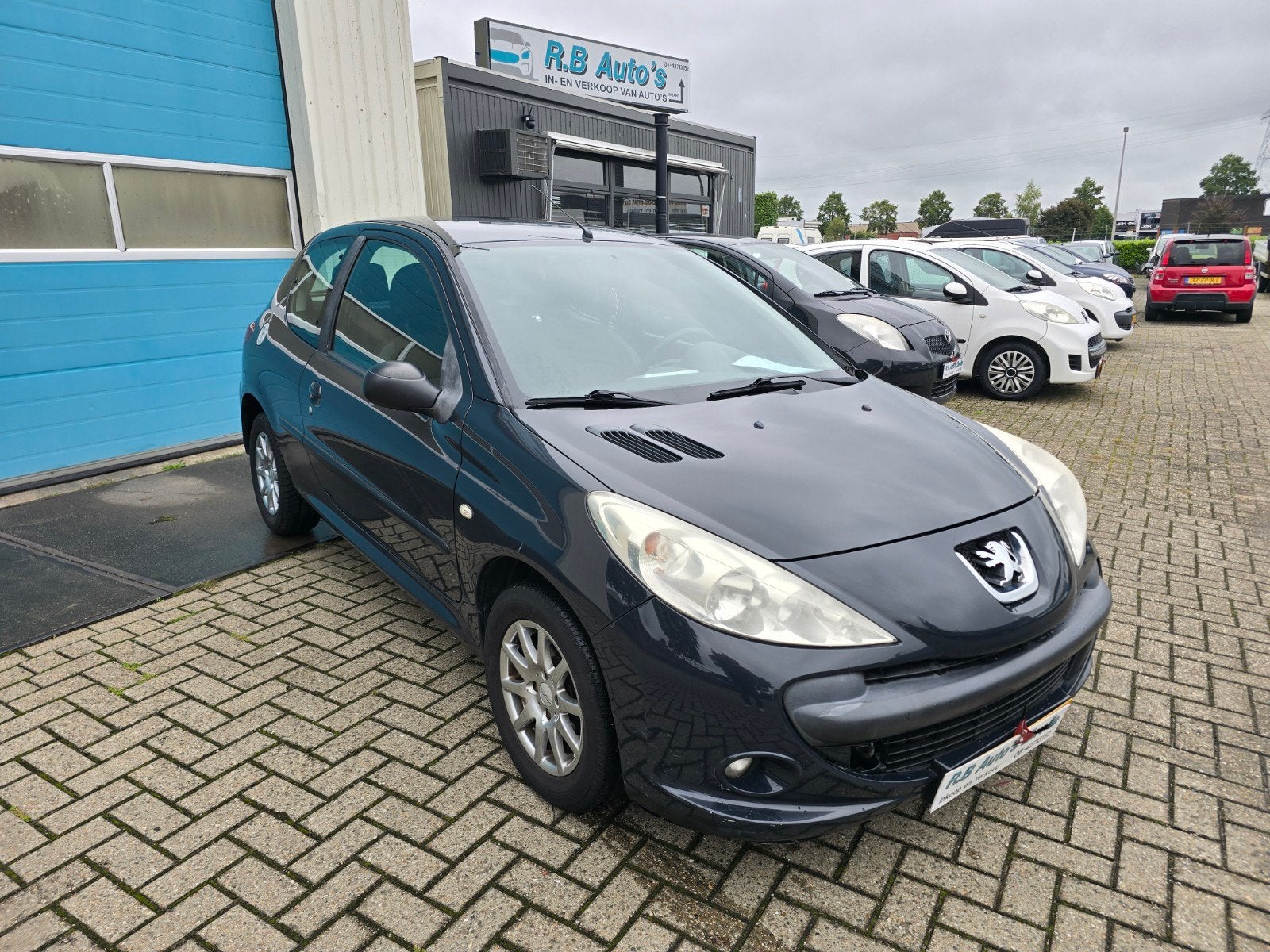 Peugeot 206+ 1.1 3D 2010 Grijs, Auto's, Voorwielaandrijving, 206+, Stof, 4 cilinders