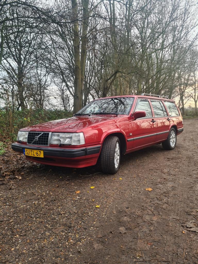 Volvo 940/740 Estate  2.3 IC AUT 1997 Rood 237.834km NAP, Auto's, Volvo, Automaat, 4 cilinders, Open dak, Grijs