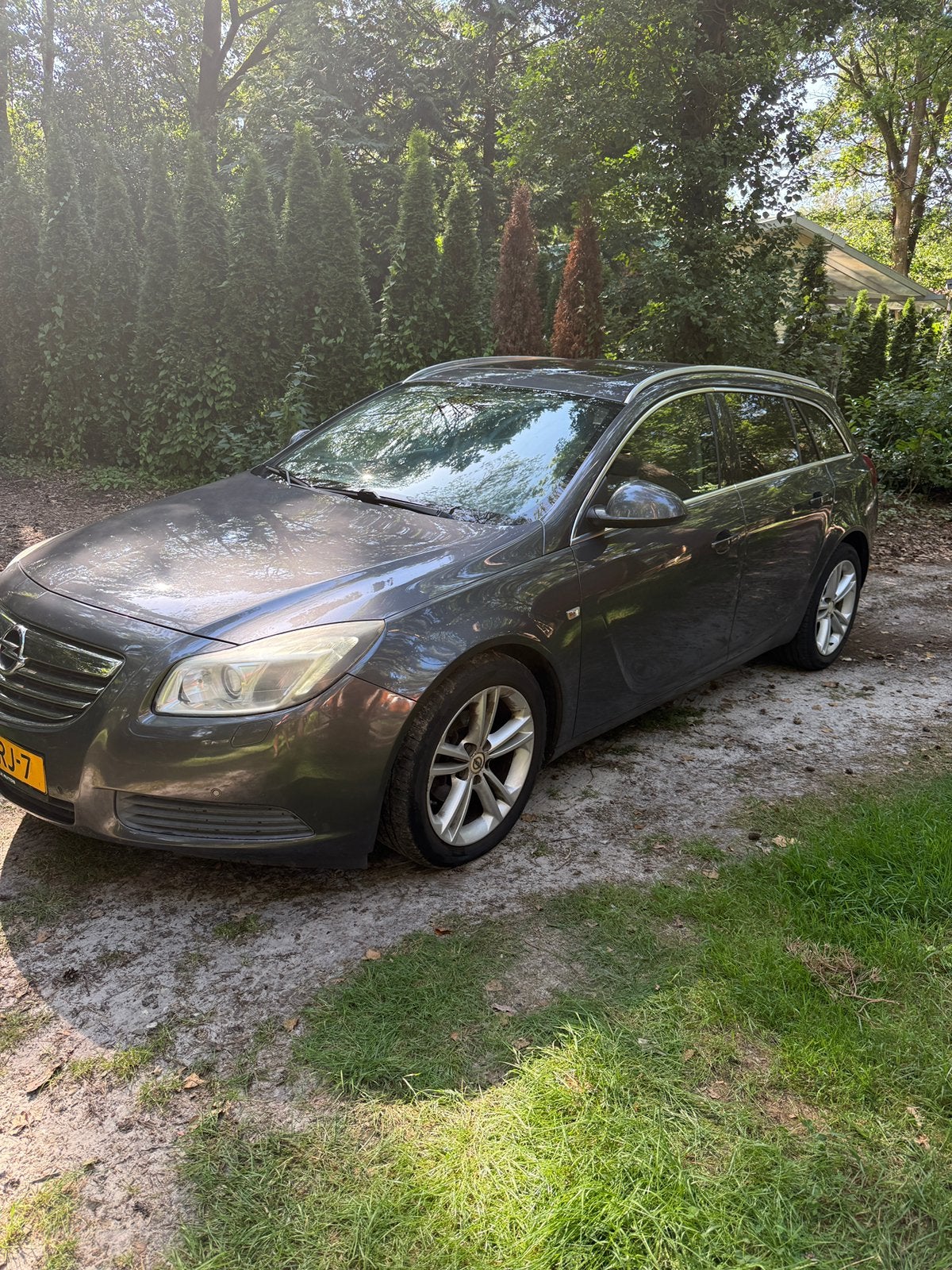 Opel Insignia 1.8 103KW Sports Tourer 2009 Grijs, Auto's, 1350 kg, 4 cilinders, 1796 cc, Origineel Nederlands