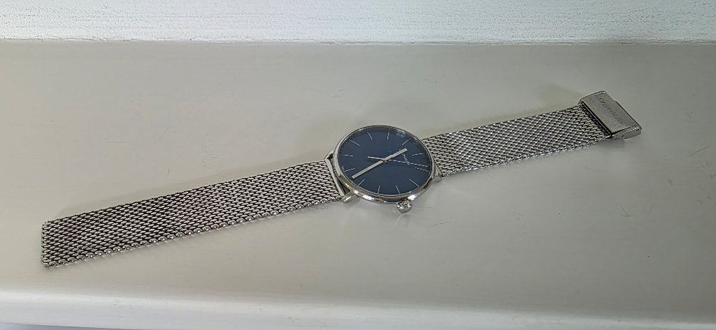 Calvin Klein High Noon Heren Horloge met blauwe wijzerplaat, Antiek en Kunst, Ophalen of Verzenden