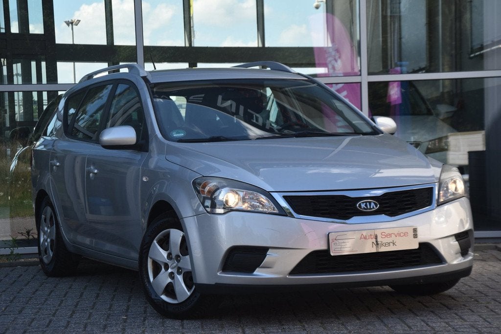 Kia Cee'd Sporty Wagon 1.4 CVVT | Airco | Trekhaak | Cruise, Auto's, Kia, Voorwielaandrijving, Stof, Gebruikt, Zwart