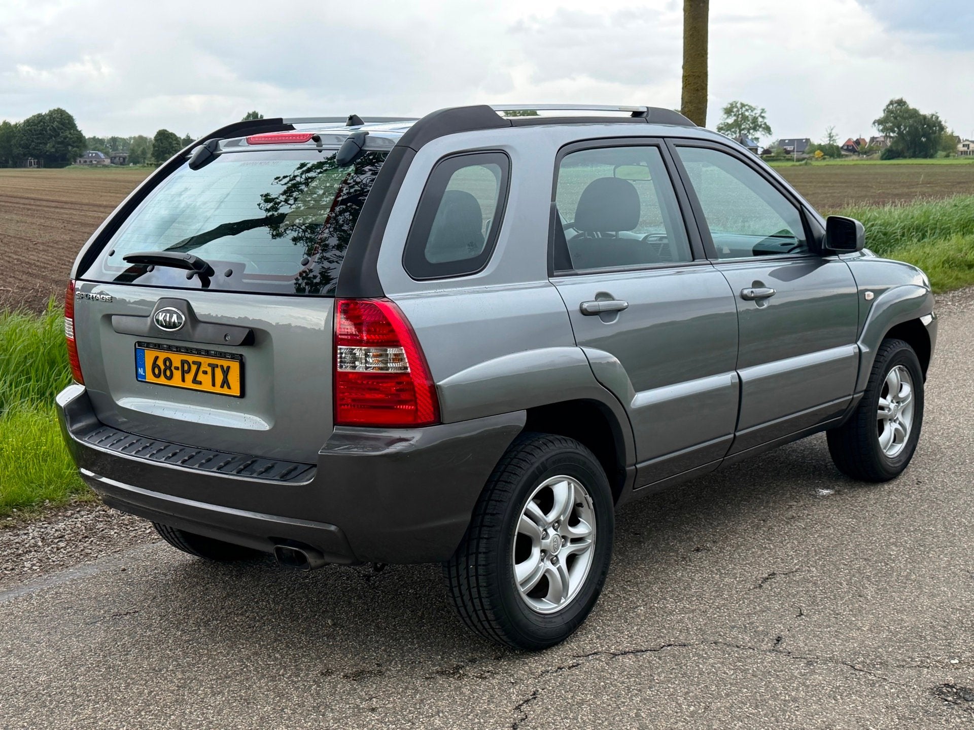 Kia Sportage 2.0 CVVT Comfort NAP APK 08-2026 Airco, Auto's, 1442 kg, Stof, Gebruikt, 4 cilinders