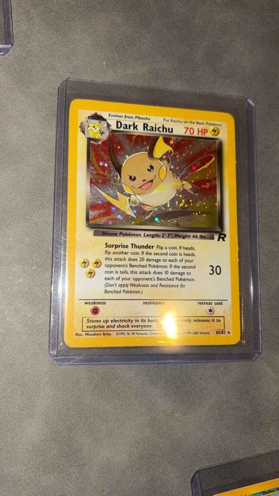 Dark raichu holo swirl 83/82 pokemon kaart  oud vintage 1995, Ophalen of Verzenden, Zo goed als nieuw, Meerdere kaarten