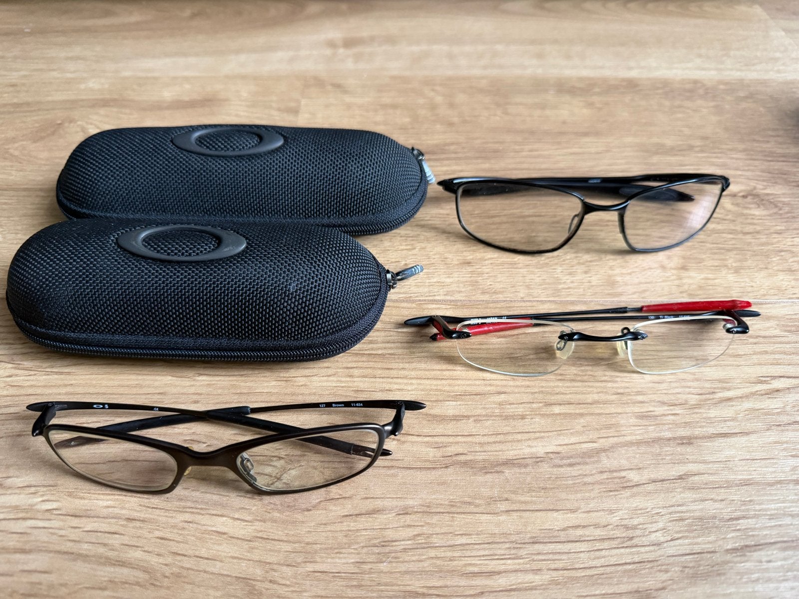 Oakley brillen met etui - 3 stuks, Gebruikt, Zwart, Ophalen of Verzenden, Oakley