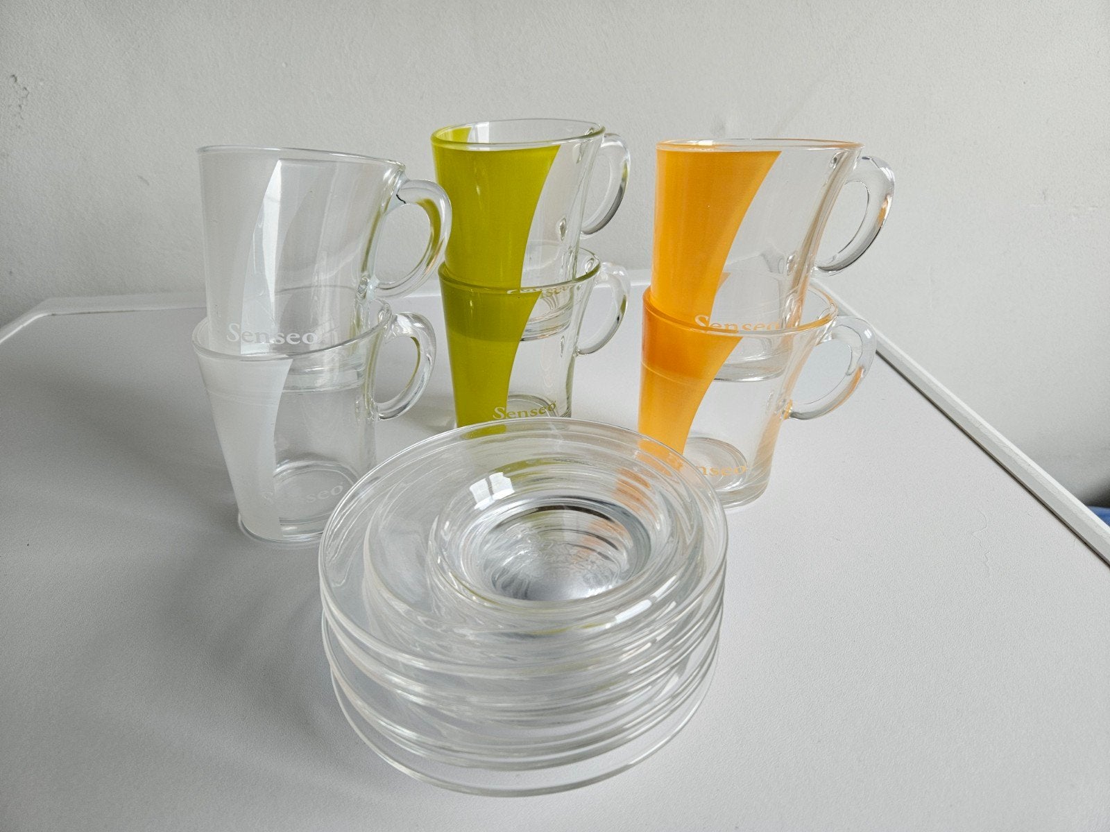 Set Douwe Egberts Senseo kop en schotels., Glas of Glazen, Ophalen of Verzenden, Modern, Glas