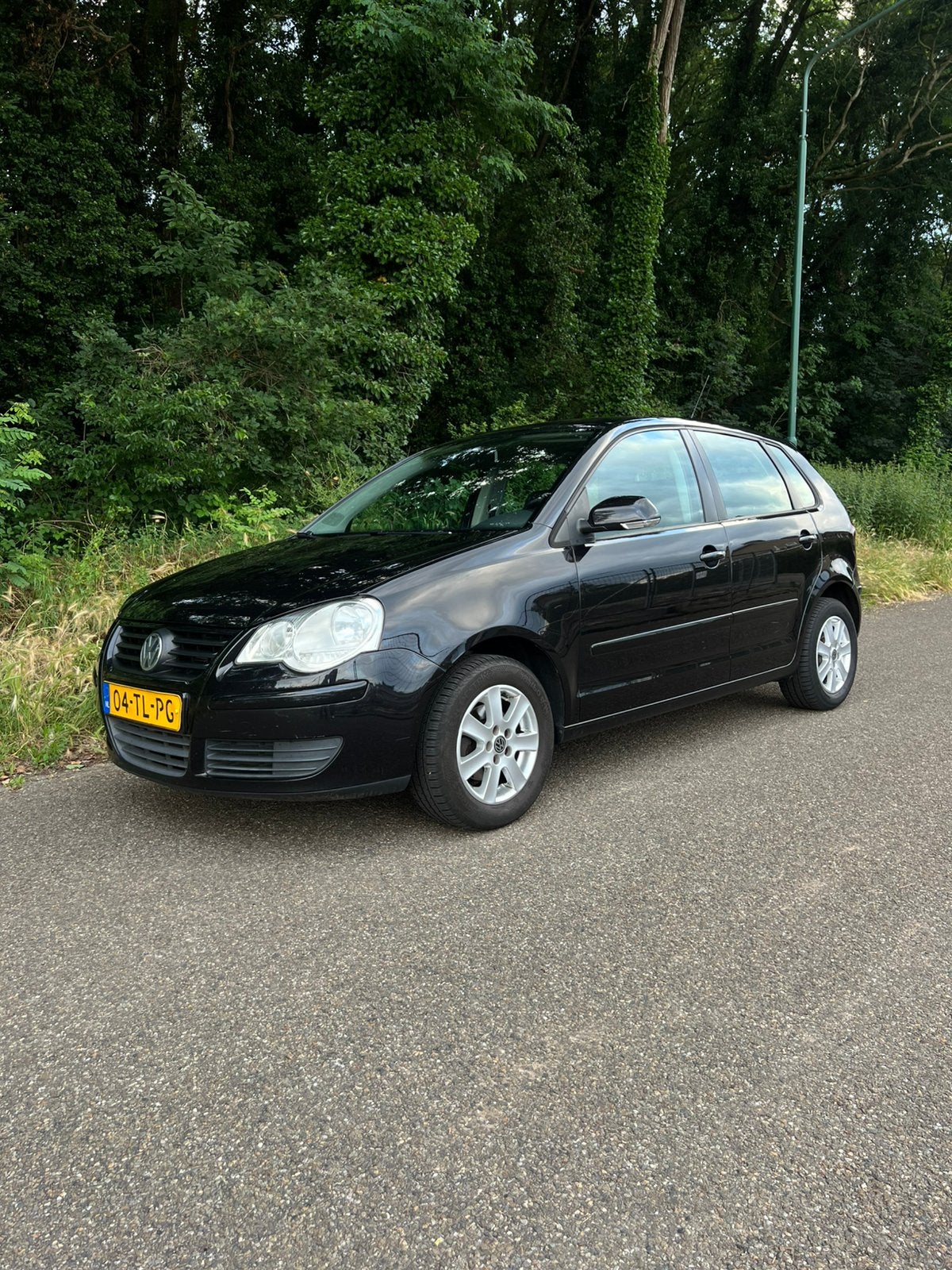Volkswagen Polo 1.4 16V Optive / NWE DSTRB & WTP etc / TRKHK, Auto's, Voorwielaandrijving, 40 €/maand, 4 cilinders, Zwart