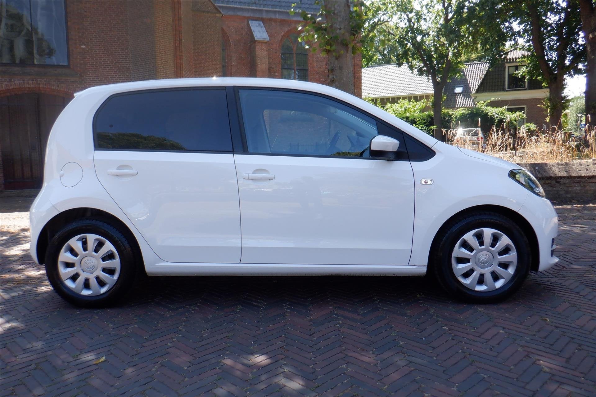 Skoda Citigo 1.0 60pk Greentech Ambition, Auto's, 12 maanden, Stof, Gebruikt, Wit