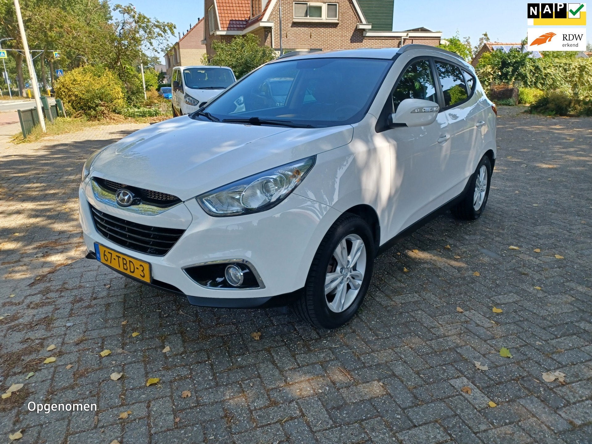 Hyundai Ix35 2.0i Business Edition, Gebruikt, Zwart, 4 cilinders, Leder en Stof