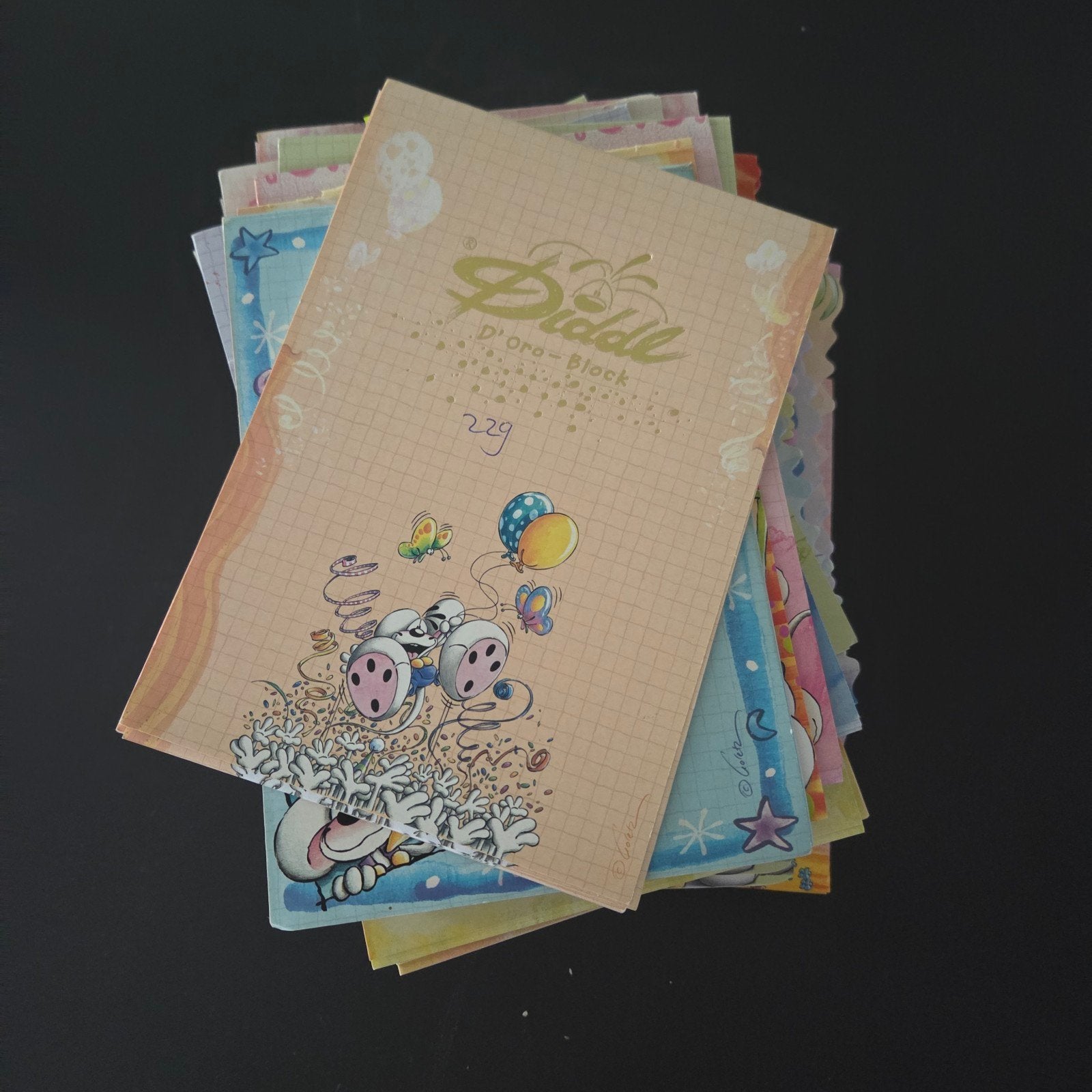 Setje gekleurde a5 blaadjes, Verzamelen, Diddl, Ophalen of Verzenden, Verschillende figuren, Zo goed als nieuw, Papier, Kaart of Schrift