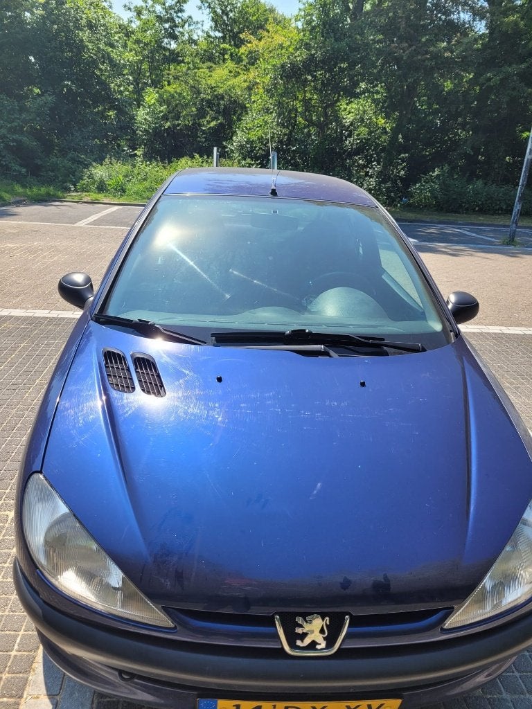 Peugeot 206, Blauw met APK tot 12-10-2027, Auto's, Voorwielaandrijving, 31 €/maand, 4 cilinders, Blauw