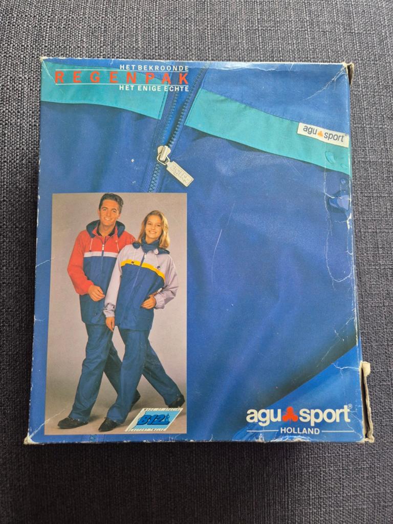 AGU Sport Regenpak Heren - Nieuw in doos, Maat L, Rood/Navy, Caravans en Kamperen, Regenkleding, Nieuw, Ophalen of Verzenden