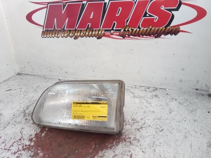 Koplamp links van een Toyota Starlet, Gebruikt, -, -, Ophalen of Verzenden