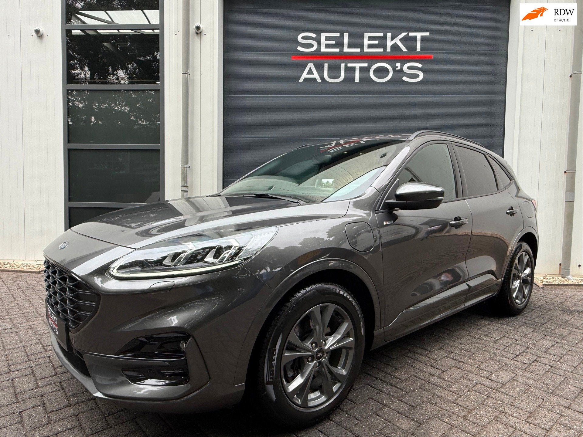 Ford Kuga 2.5 PHEV ST-Line X 224 Pk Cruise/Climate/Leder/Alc, Auto's, Ford, Gebruikt, Zwart, 4 cilinders, Origineel Nederlands