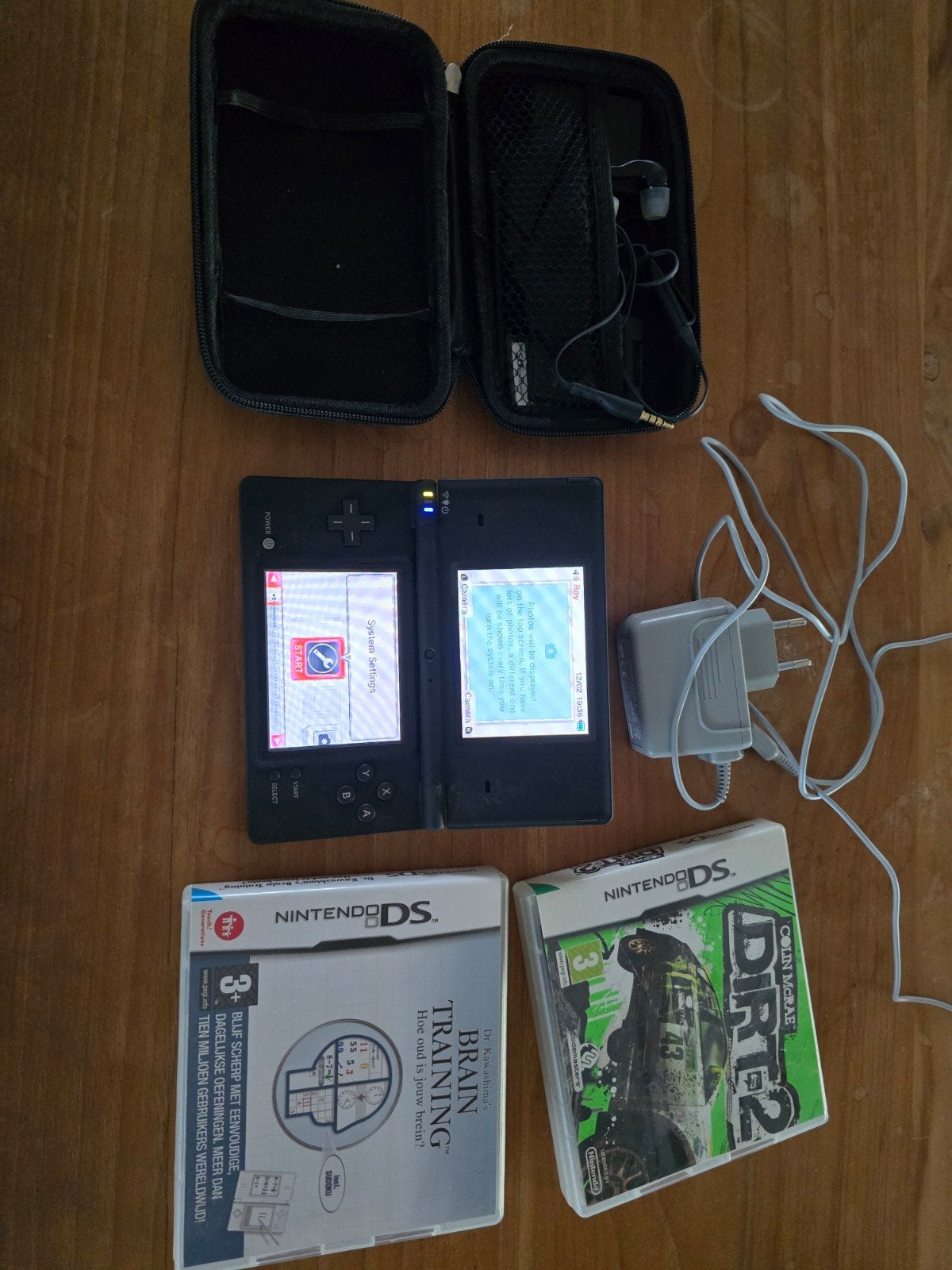 Nintendo DS met 2 spellen en accessoires, Spelcomputers en Games, Games | Nintendo DS, 1 speler, Ophalen of Verzenden, Puzzel en Educatief