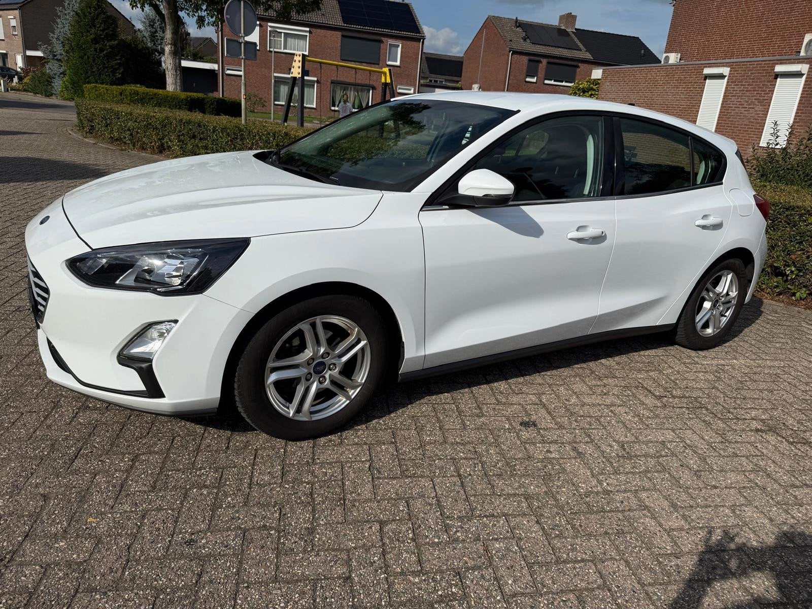 Ford Focus 1.0 EcoBoost Hybrid Trend Edition Business, Auto's, Gebruikt, Wit, Origineel Nederlands, Handgeschakeld