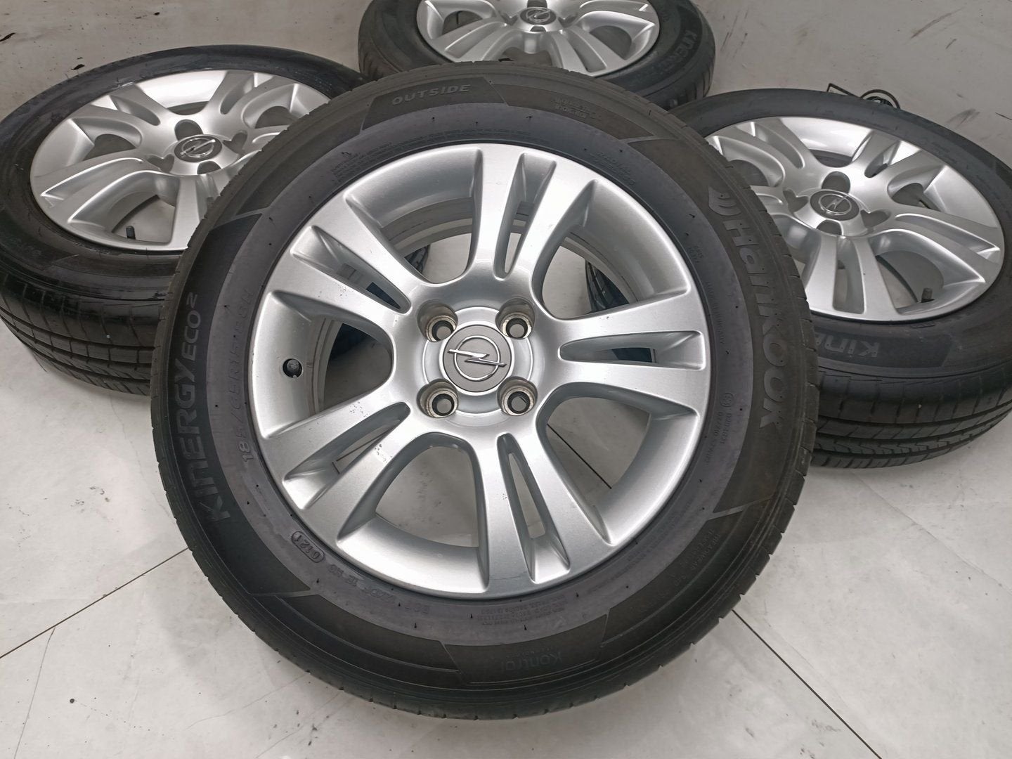 Opel Corsa lichtmetaal velgen 15"inch 4x100, Gebruikt, -, -, Banden en Velgen