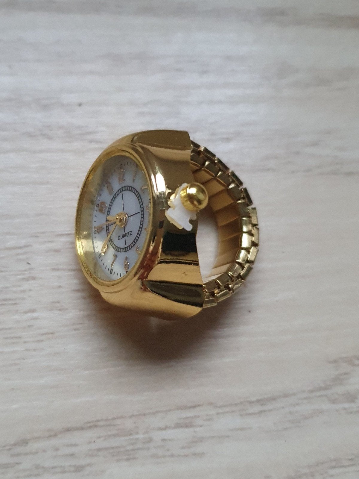 Goudkleurige ring horloge (nieuw), universele maat., IJzer of Staal, Nieuw, Ophalen of Verzenden, Dame