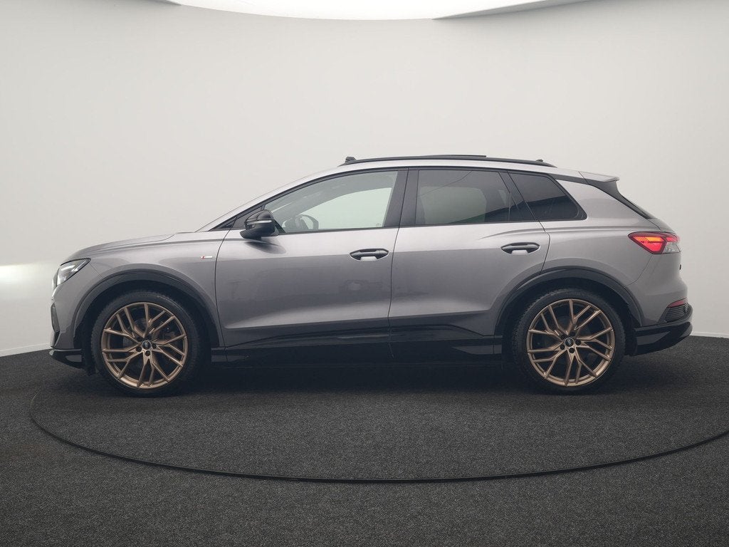 Audi Q4 e-tron 50 Quattro Edition One 2x S Line 77 kWh 300pk, Auto's, Audi, Automaat, Gebruikt, SUV of Terreinwagen, Zilver of Grijs