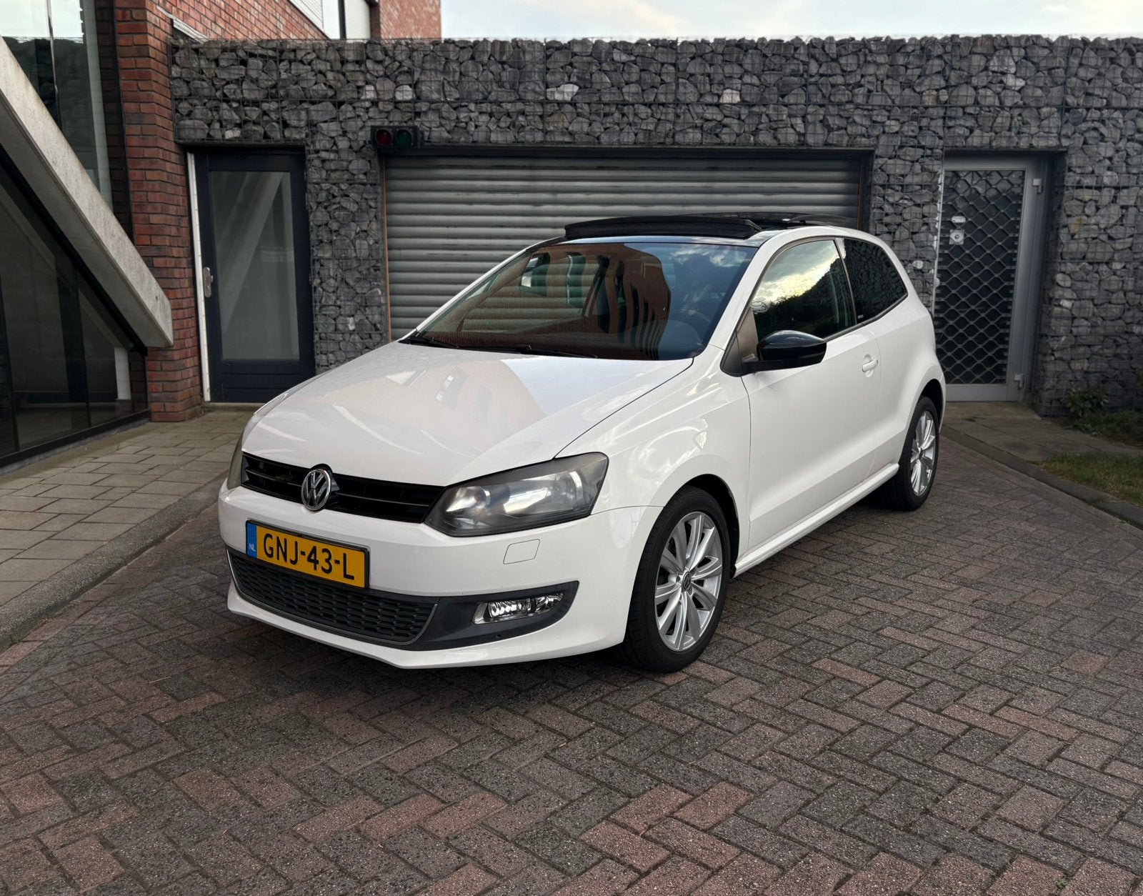 Volkswagen Polo 1.2 Benzine 2012 Panoramadak Stoelverwarming, Voorwielaandrijving, Euro 5, 967 kg, Zwart