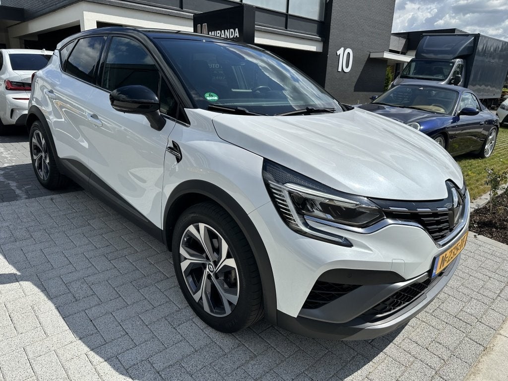 Renault Captur 1.0 TCe R.S. Line (bj 2022), Auto's, Gebruikt, Euro 6, Leder en Stof, Wit