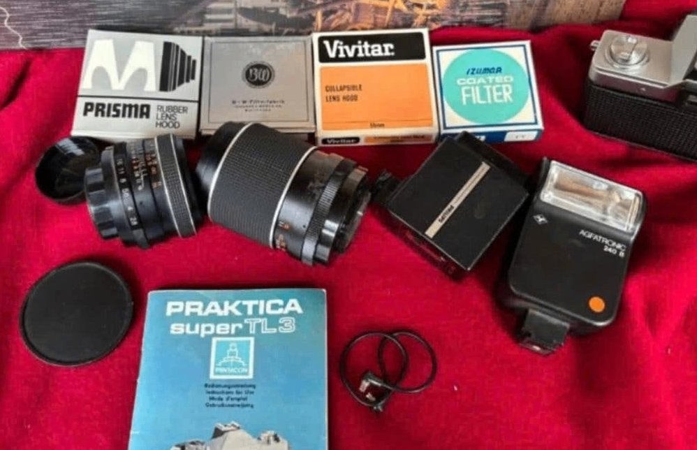 Practica Super TL spiegelreflexcamera + lenzen koffer + ass., Ophalen of Verzenden, Gebruikt, Spiegelreflex, Overige Merken