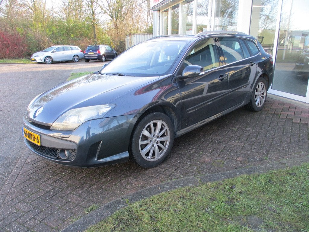 Renault Laguna Estate 2.0 16V Expression (bj 2010), Auto's, Laguna, Stof, Gebruikt, Zwart