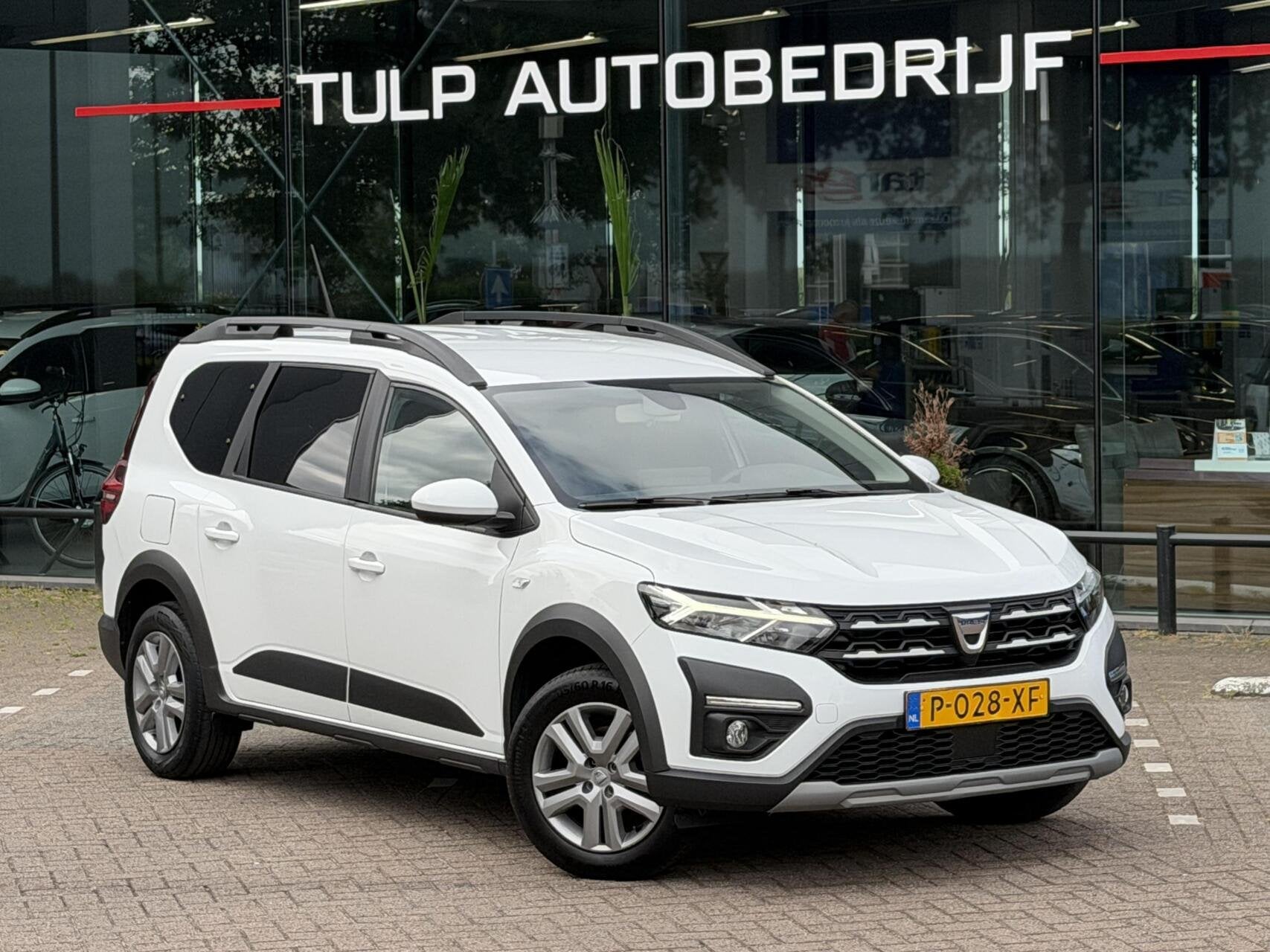 Dacia Jogger 1.0 TCe Bi-Fuel Comfort 7p. Airco Cruise NAP, Auto's, Voorwielaandrijving, Stof, 7 stoelen, Wit
