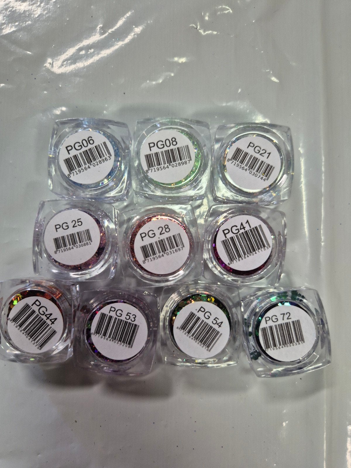 Nieuw 10x Urban Nails Pixie Glitters pakket 3, Overige kleuren, Nieuw, Ophalen of Verzenden, Handen en Nagels