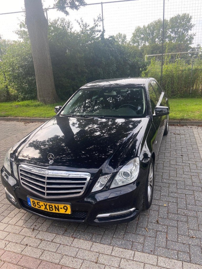 Mercedes-Benz E-Klasse 1.8 E200 CGI Sedan AUT 2011 Zwart, Auto's, Mercedes-Benz, Achterwielaandrijving, Zwart, 4 cilinders, Zwart